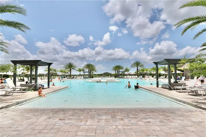 Community pool featuring a patio area