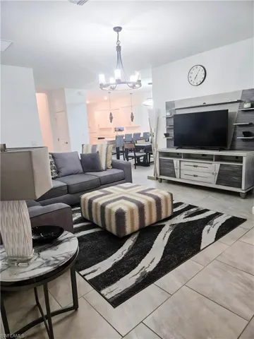 Living area featuring a chandelier