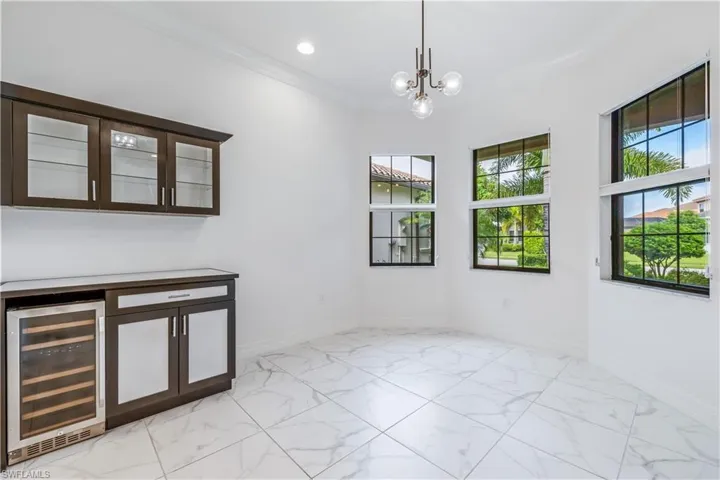 Built in bar area with wine fridge