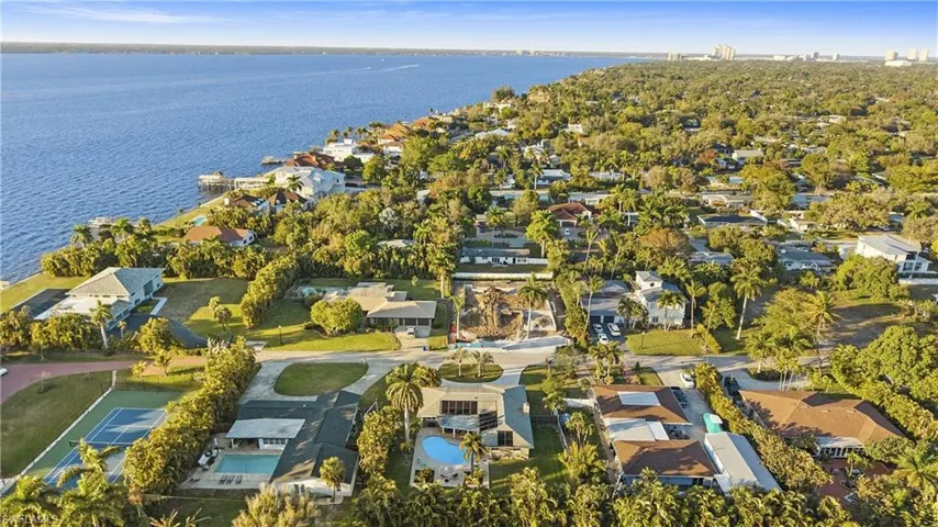 Aerial view of residential area with a nearby body of water