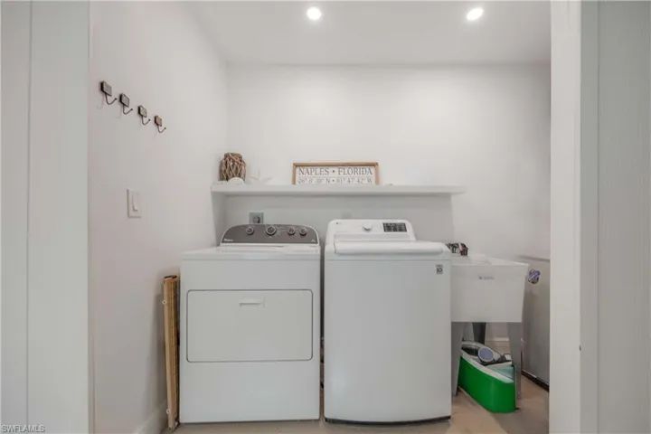 Washroom featuring separate washer and dryer