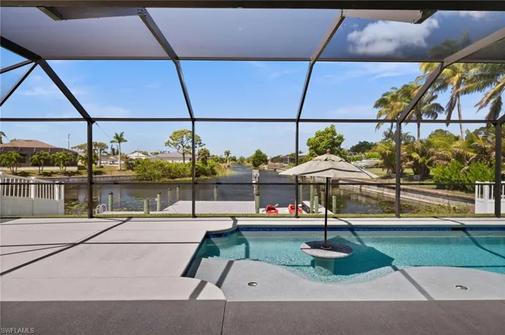 Amazing views of the pool and intersecting canal from the lanai