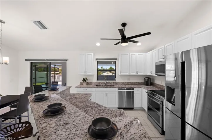 Granite countertops and stainless appliances in the kitchen