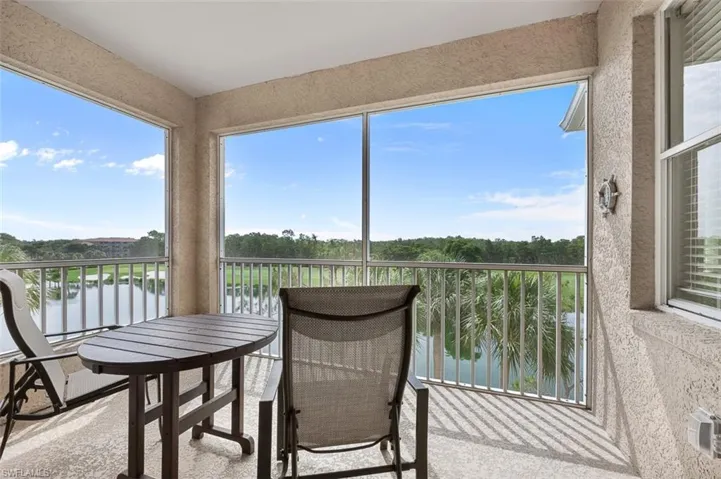 Balcony with a water/golf view
