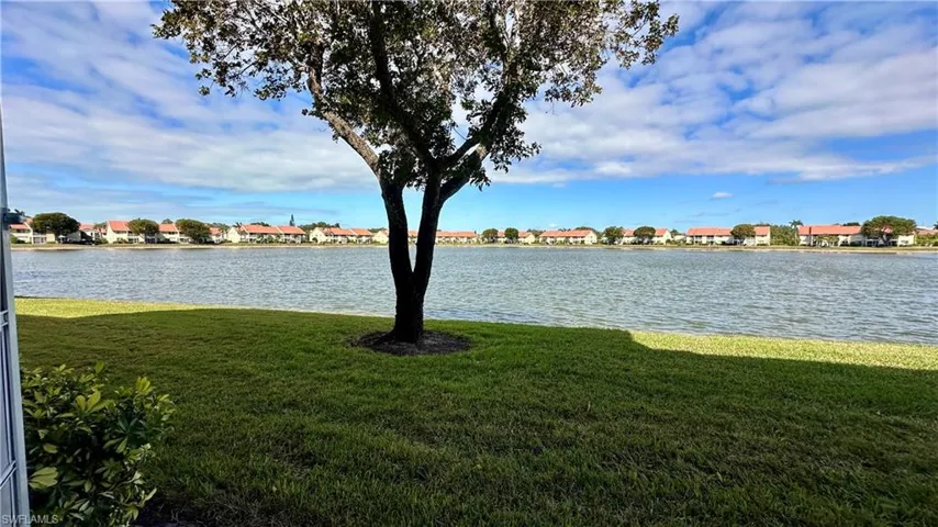 Water view featuring nearby suburban area