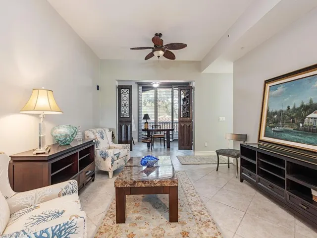 Tiled living room with ceiling fan