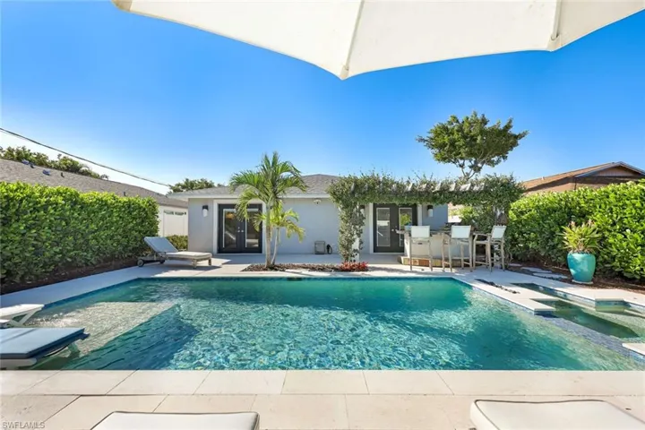 Sunbath or take a dip in the sparkling pool.