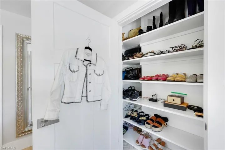 Closet in primary bathroom