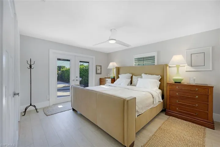 Primary bedroom with king size bed.