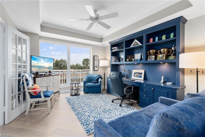 Den with easy access to the living room.