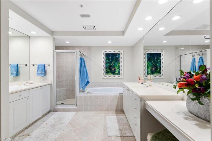 Primary bathroom with dual sinks and plenty of counter space.