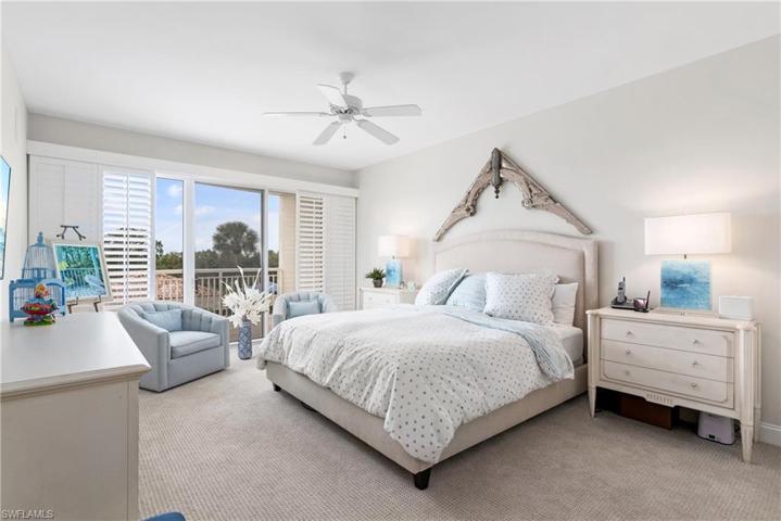 Primary bedroom with plantation shutters, and two very large, separate closets.