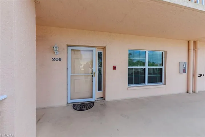 Doorway to property with a patio