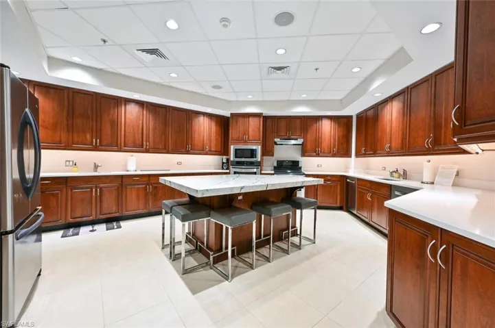 2 dishwashers, 2 sinks & cabinets are full of dishes, glasses, etc.