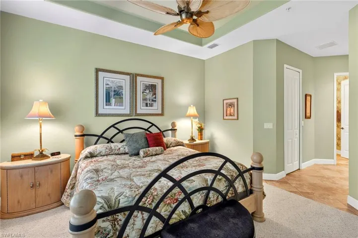 Bedroom featuring a closet and a ceiling fan