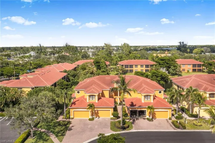 Aerial view of residential area with a tree filled landscape