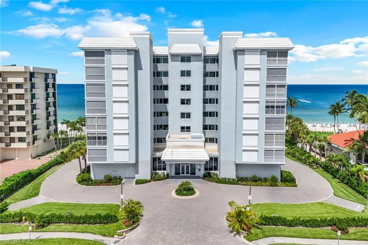View of building exterior featuring a water view