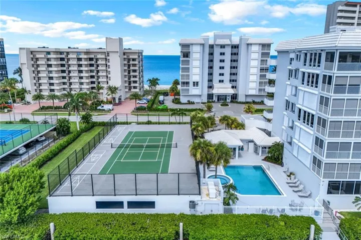 Pool area has a covered dining and bar area, grill and separate bathrooms. Andif you haven’t tried Pickleball yet, you have your own private court.