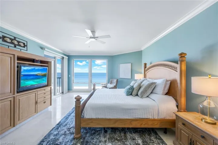 Primary suite opens to beachfront lanai. What better sound is there than to fallasleep to the lull of the ocean waves?