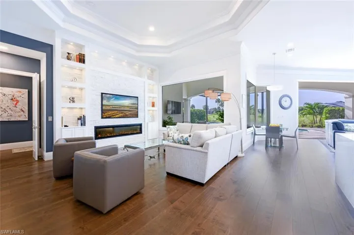 Living room with Built-in TV and Electric Fireplace