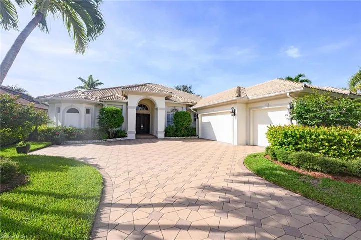 Beautiful curb appeal and 3 car garage