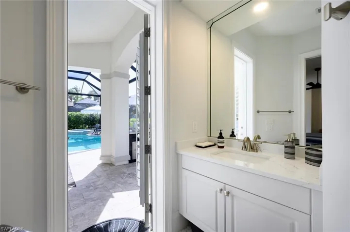 Bathroom with vanity and tile patterned floors