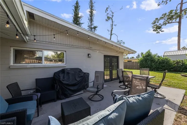 View of patio / terrace with area for grilling, outdoor lounge area, and french doors