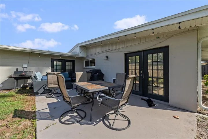 View of patio / terrace featuring french doors and area for grilling