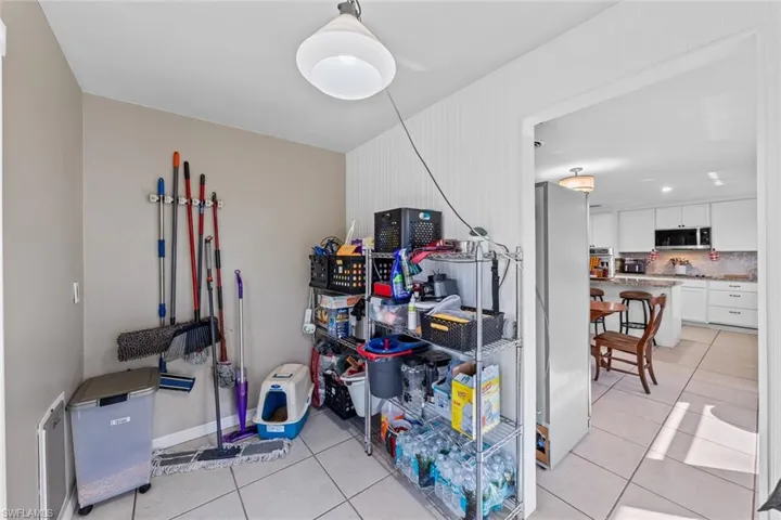 Misc room featuring light tile patterned flooring