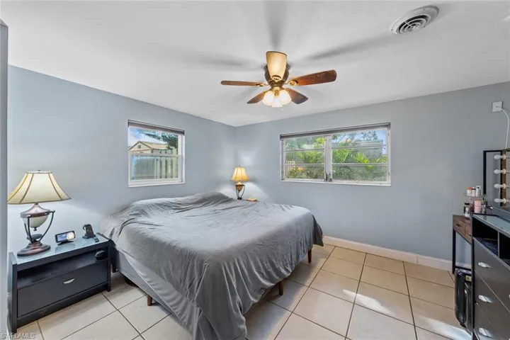 Bedroom featuring ceiling fan and light tile patterned floors