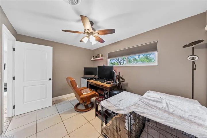 Bedroom featuring ceiling fan and light tile patterned floors
