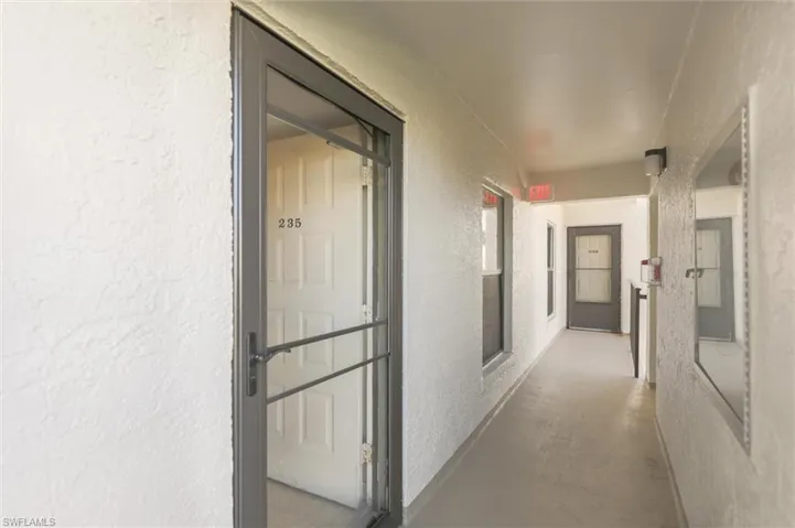 Hallway with concrete flooring