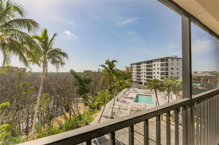 Balcony featuring a pool
