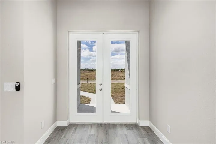 hardwood / wood-style floors and french doors Finishes may vary, pictures for illustration purposes only