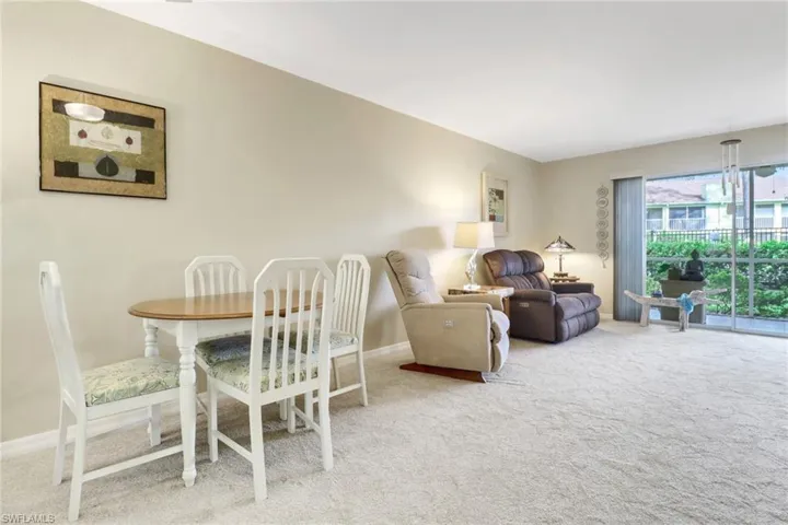 View of carpeted dining space