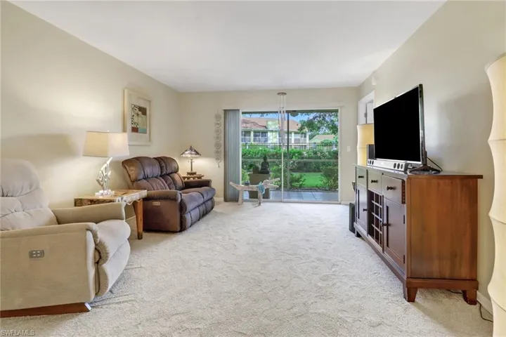 Living room with light carpet