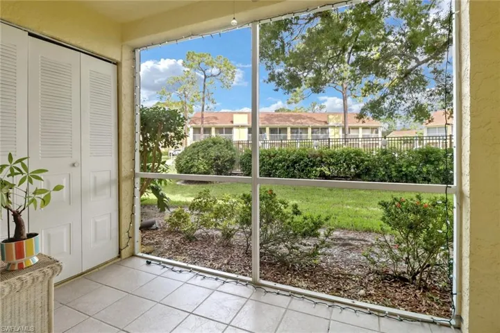 Doorway to outside with light tile patterned floors
