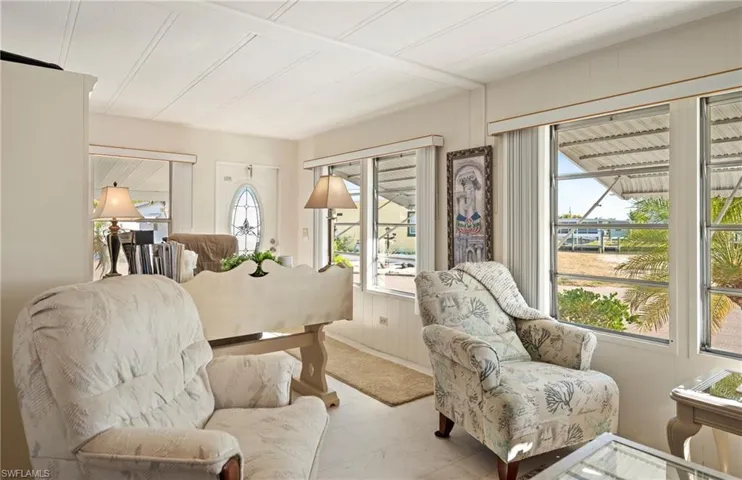 Bedroom featuring wooden walls