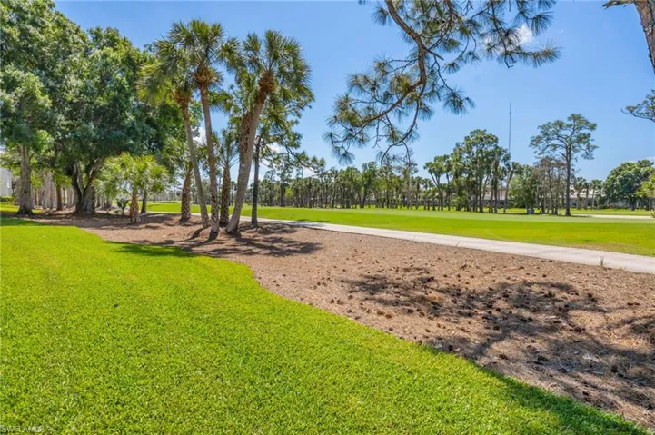 Surrounding community featuring view of golf course