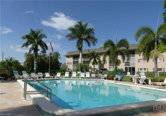Community pool with a patio area