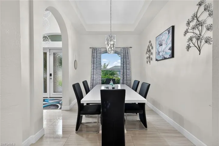 Formal dining area open to living/kitchen area