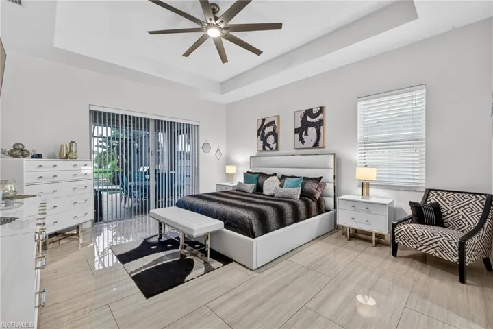 Primary bedroom very spacious and opens to lanai and pool
