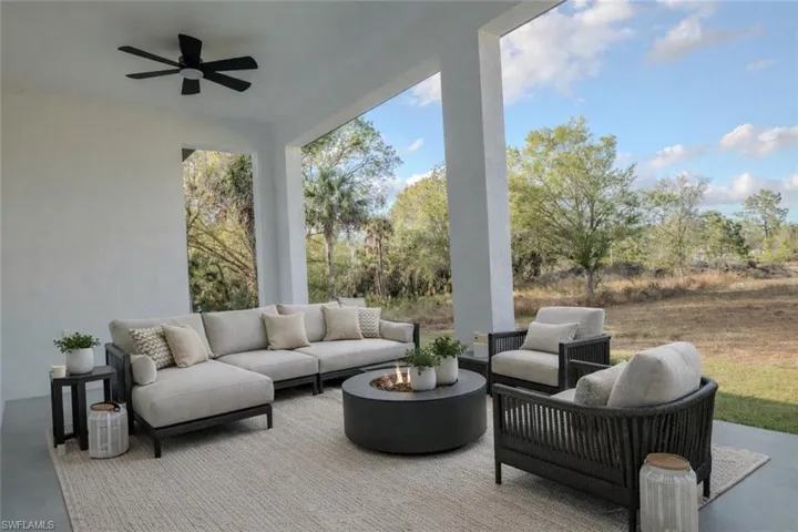 View of patio / terrace featuring a ceiling fan and outdoor lounge area. (Lanai)