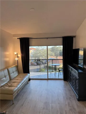 Living room with light wood-style floors