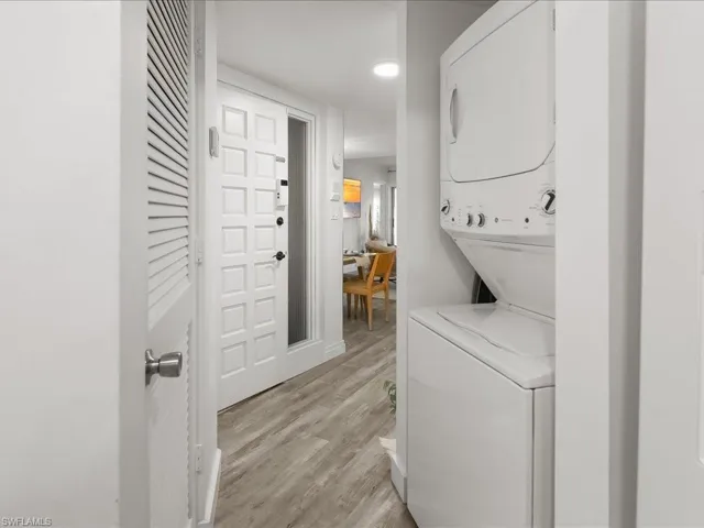 staching washer and dryer is located adjacent to the kitchen for convenience.