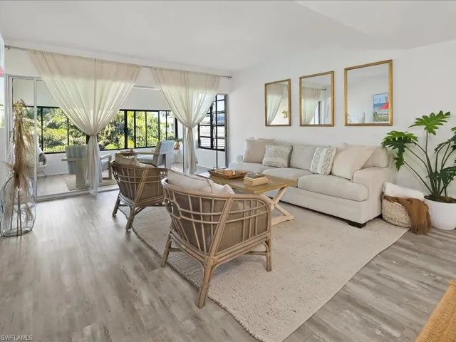 Volume ceiling gives a feeling of spaciousness, and the entire home is enhanced by beautful new luxury vinyl plank flooring.