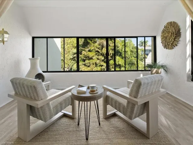Such a peaceful way to start the day...enjoying quiet time in this attached Florida room.