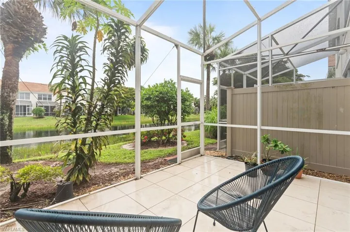 Unfurnished sunroom with a patio