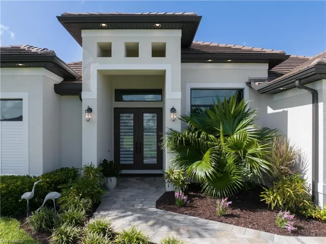 Doorway to property with french doors