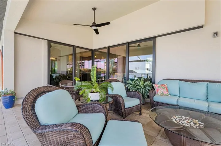 View of patio / terrace featuring an outdoor hangout area and ceiling fan